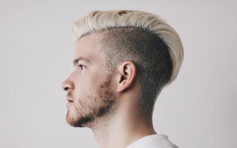 Man with the hair color he wants thanks to rebelbarbers
